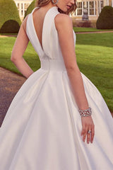A Line Halter Sleeveless Sweep Train Satin Wedding Dress With Pockets