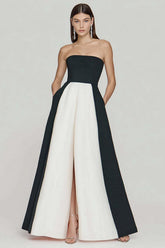 Black and white color block strapless satin A-line prom dress with front slit and hidden pockets, full front view