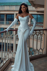 Elegant Trumpet/Mermaid Satin Wedding Dress with Strapless Sleeveless Design and Sweep Train