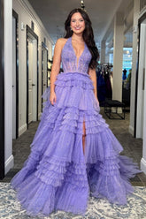 Lilac glitter tulle halter A-line prom dress with sheer sequined corset bodice, front slit and tiered ruffle skirt, front view