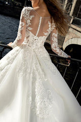 Illusion Neck A Line Wedding Dress with Long Sleeves and Sweep Train crafted from Lace and Tulle