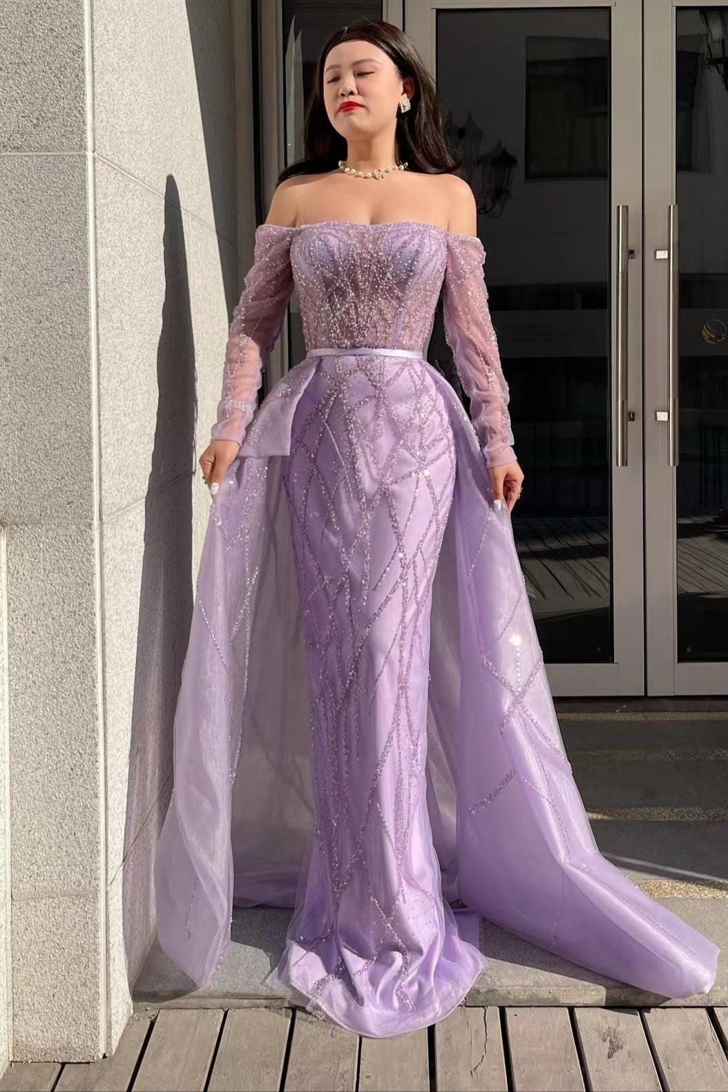 Long sleeve beaded off-the-shoulder mermaid prom dress with detachable tulle train, front view