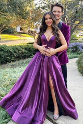 Purple satin A-line prom dress with plunging V-neck bodice, spaghetti straps and high slit
