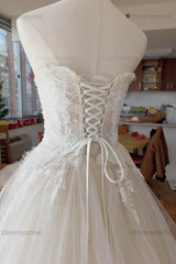 Strapless A Line Wedding Dress Sleeveless Lace Appliqued Floor Length Tulle Bridal Gown