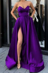 Strapless satin A-line prom dress in purple with sweetheart neckline and high slit