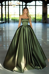 Strapless satin ball gown prom dress in dark green with a fitted bodice and full pleated skirt