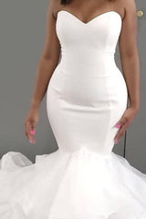 Sweetheart Tulle/Elastic Satin Wedding Dress With Cascading Ruffles Trumpet/Mermaid