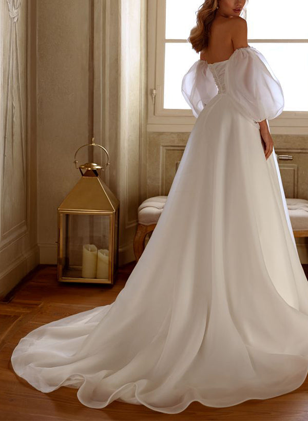 Elegant Organza Wedding Dress with Beading and A-Line Silhouette