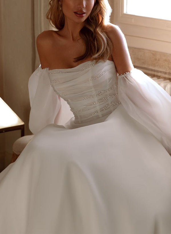 Elegant Organza Wedding Dress with Beading and A-Line Silhouette