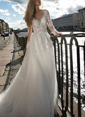 Illusion Neck A-Line Wedding Dress with Long Sleeves and Sweep Train crafted from Lace and Tulle