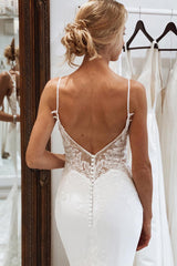 Elegant Backless White Mermaid Lace Wedding Dress with Button Accents