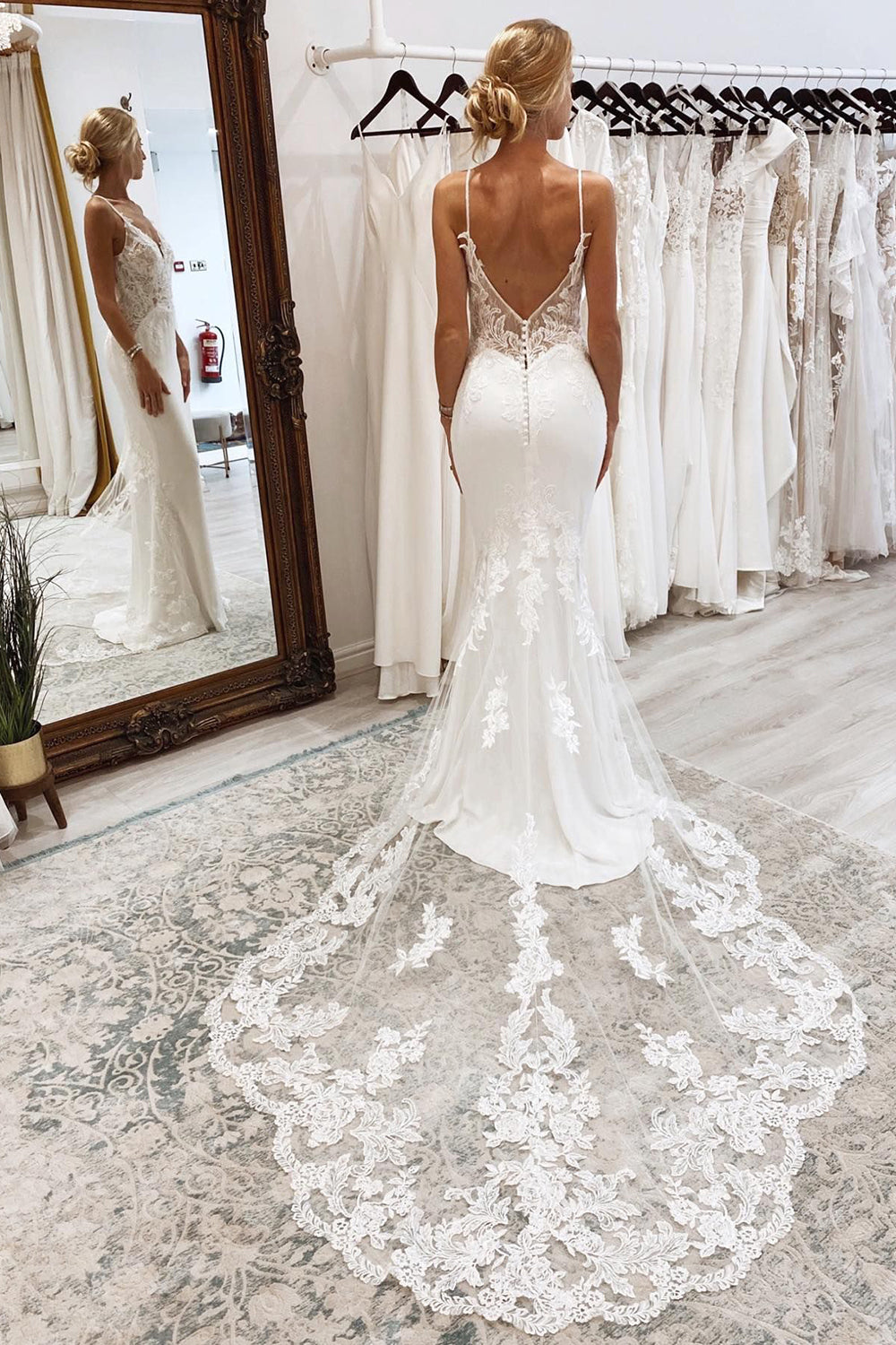 Elegant Backless White Mermaid Lace Wedding Dress with Button Accents