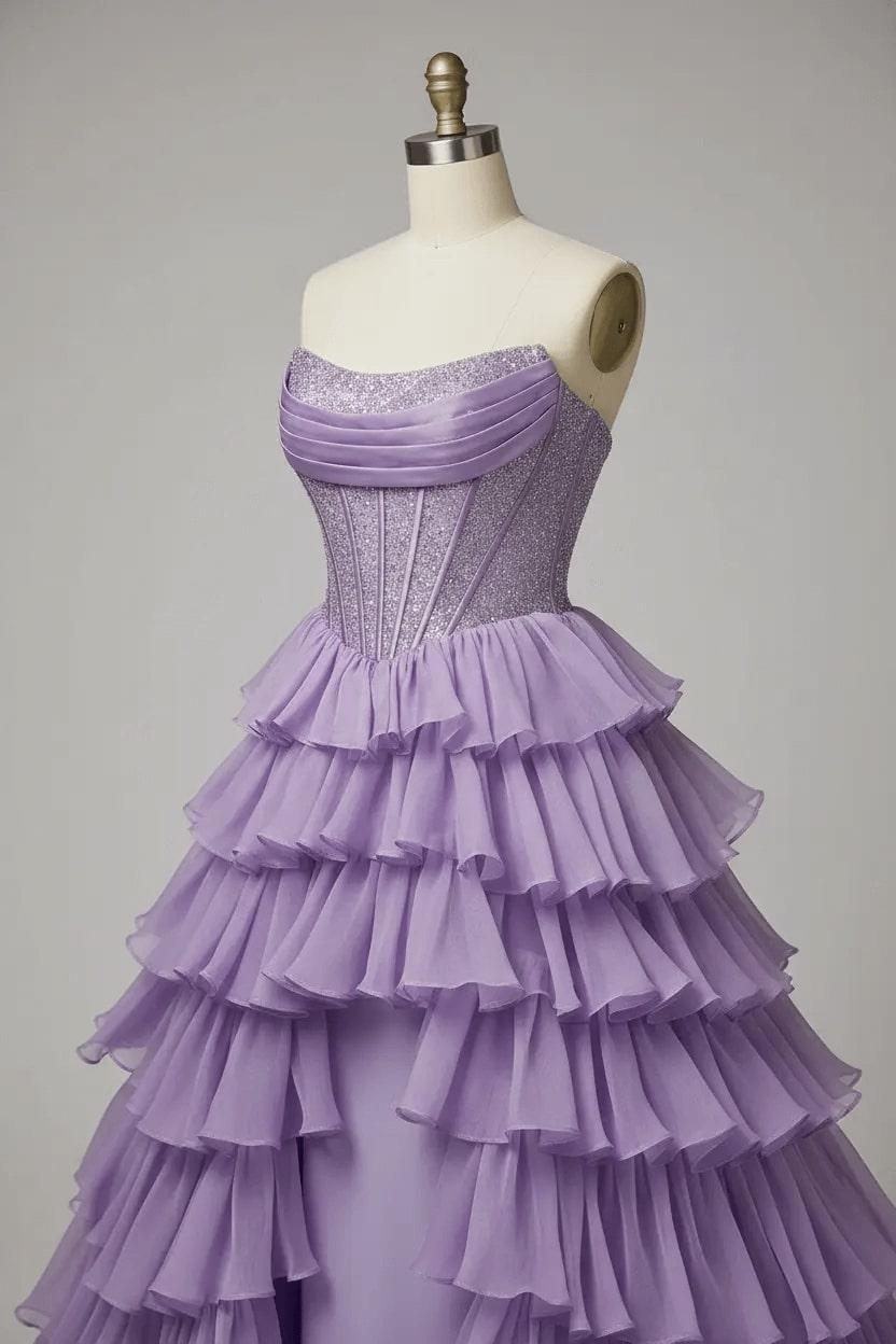 Detail of tiered chiffon ruffles and beaded bodice panels on the lilac prom dress
