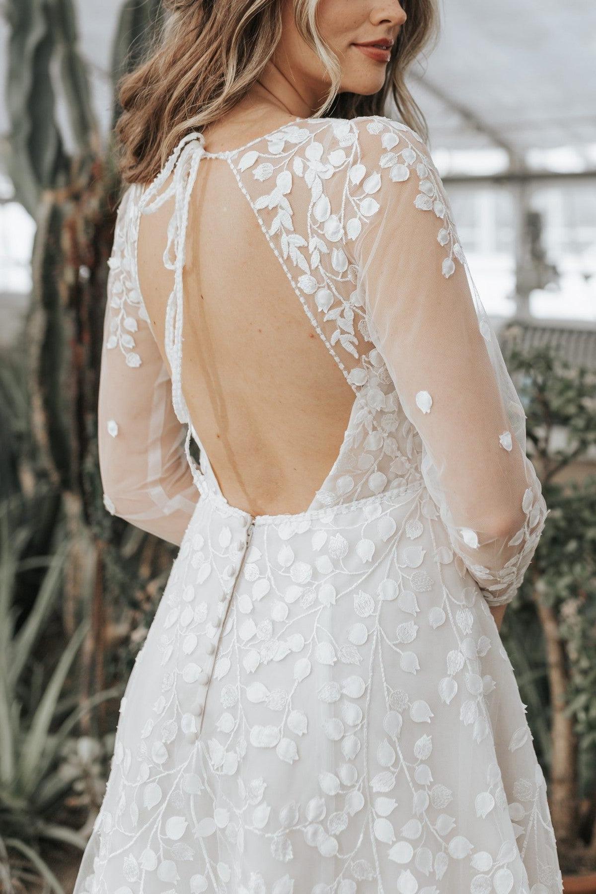 Long A Line Unique V Neck Long Sleeves Appliques Bridal Gown With Slit