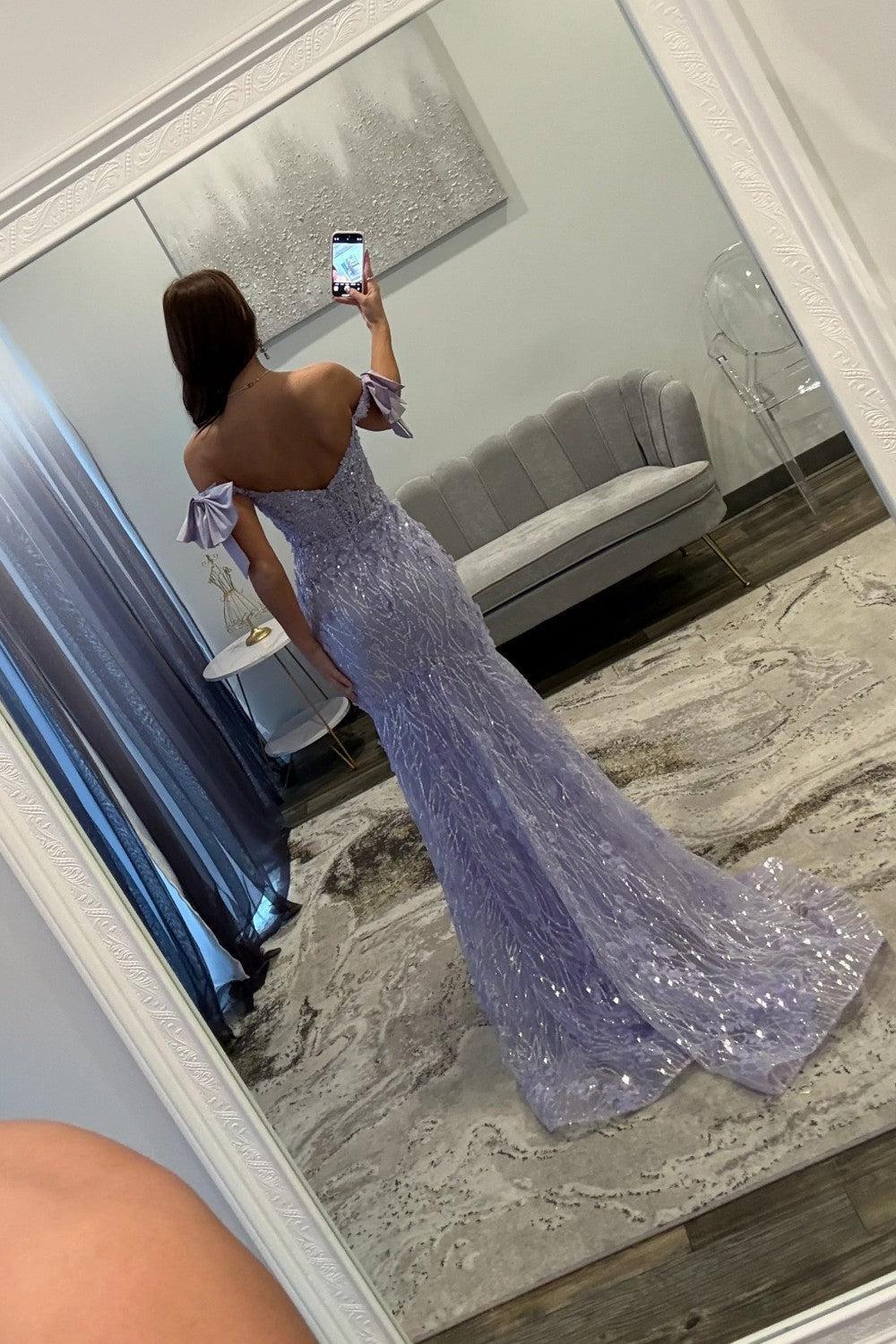 Back view of the lavender sequin prom dress showing the zipper back and sweep train