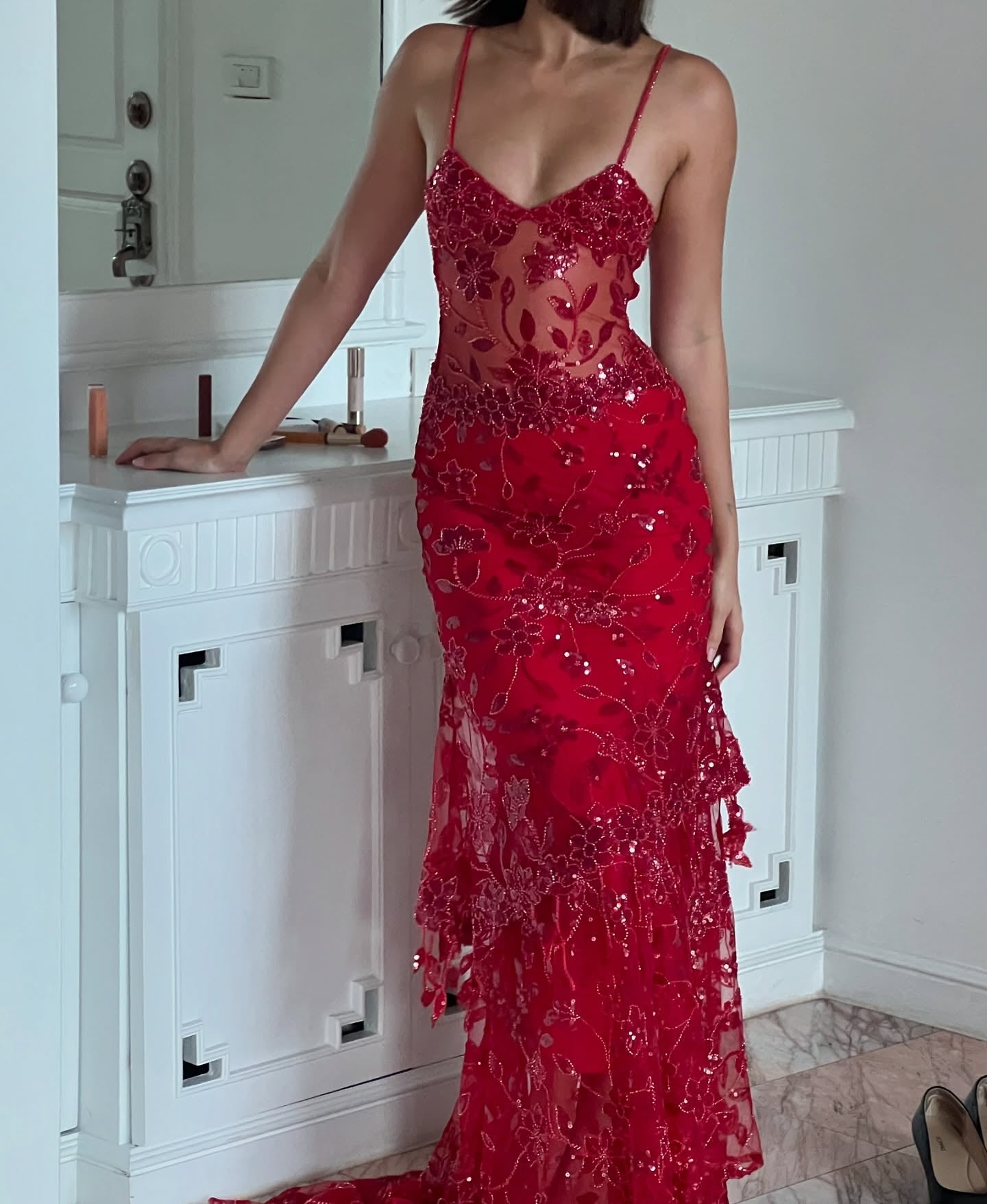 Fitted mermaid silhouette with sequin floral overlay and lace-up back