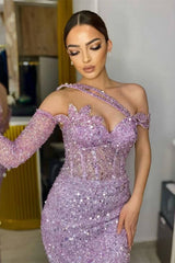 Close-up of lavender sequin prom dress showing 3D floral applique and one-shoulder strap