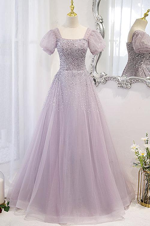 Lilac A-line prom dress with a sequin-beaded square neck bodice and sheer puff sleeves on a dress form