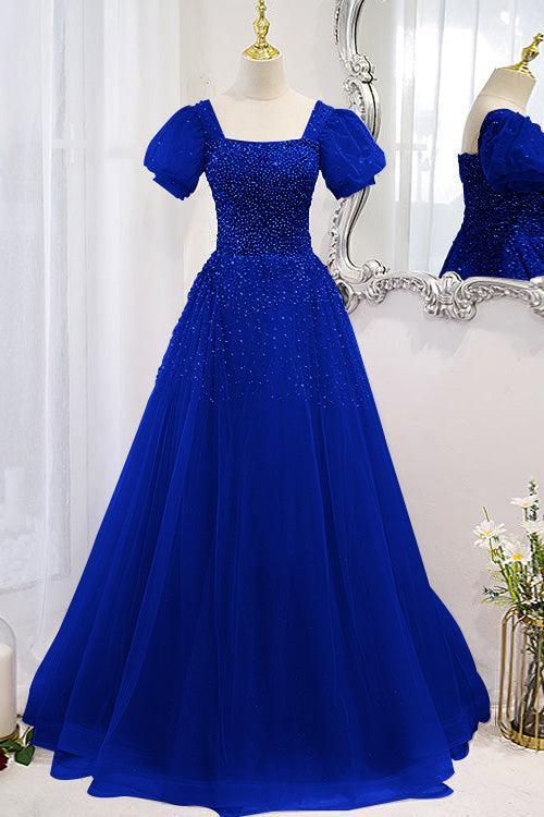 Royal blue sequin-beaded A-line prom dress with square neck and puff sleeves on a dress form